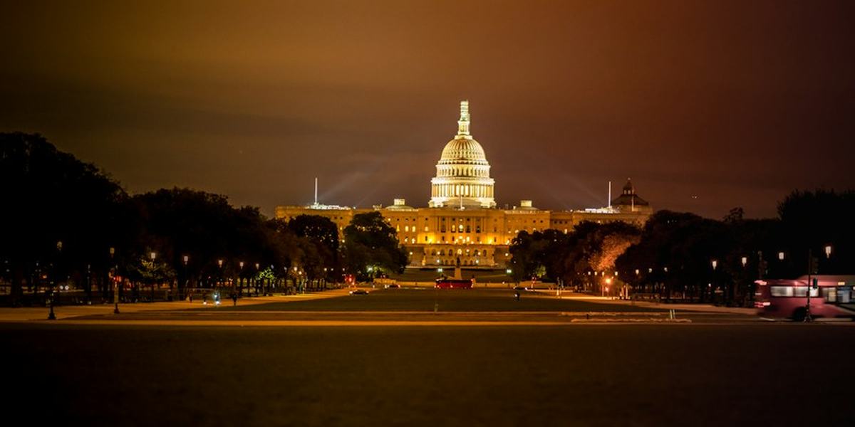 The United States Capitol lit at night