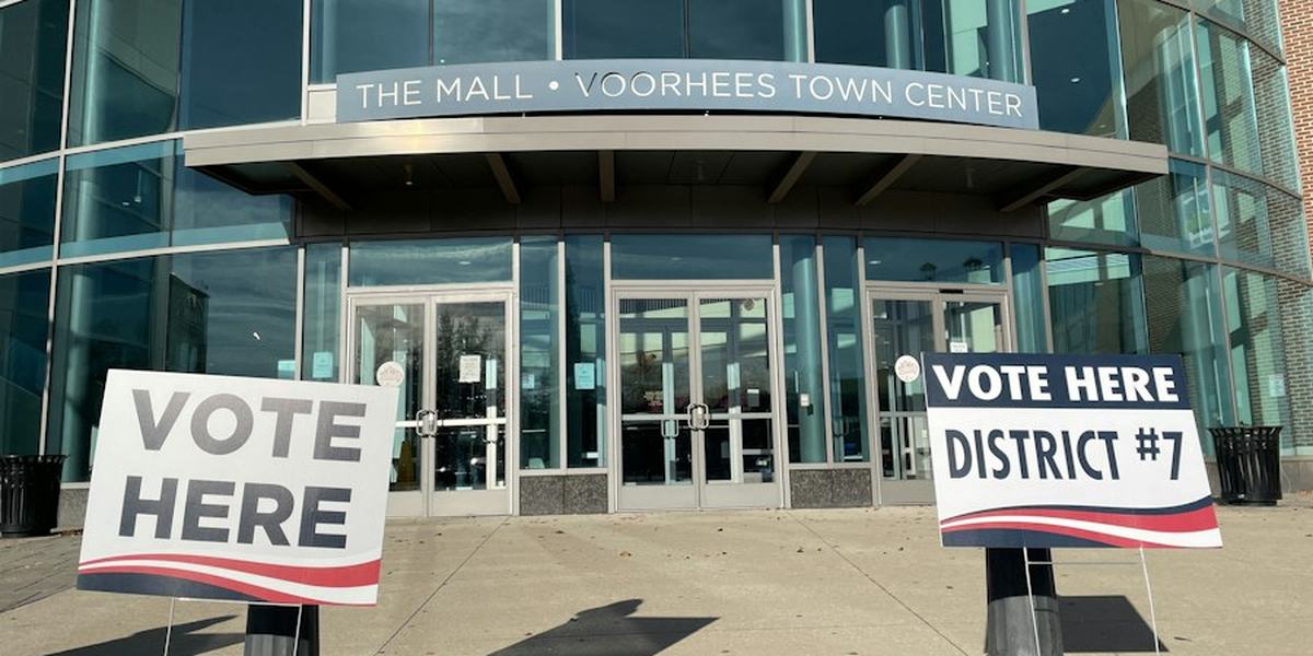 Vote Here signs outside a shopping centre entrance